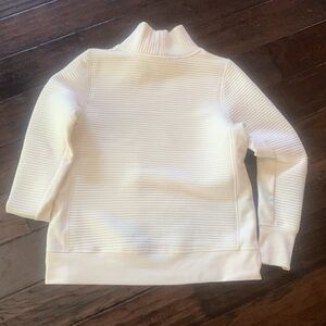 All in Motion Cream Turtleneck Sweater